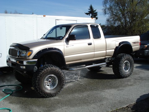 2001 Toyota Tacoma TRD 4X4 Extra Cab. 3" Cowl Hood Being Installed in a 