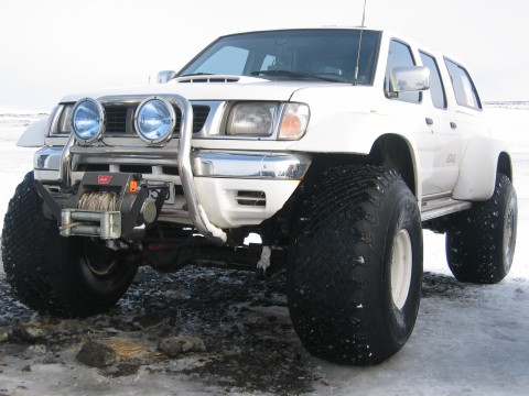 Nissan pickup truck on 44 inch tires. Here is a nice low-rider Nissan Double 