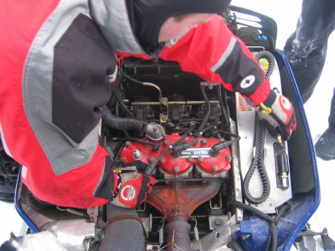 Fixing the snowmobile