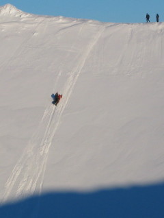 Snowmobile at great steepness