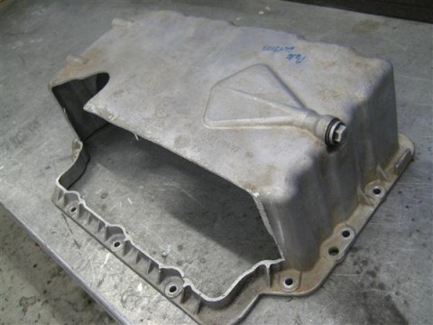 The oil pan needs a little cutting to make space for the steering rod.