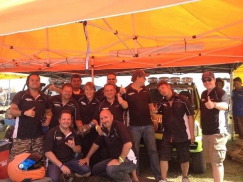 TEAM WERK1 taking a picture with the Paris Dakar legend, Jutta Kleinschmidt. WOW! She can drive!