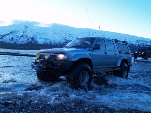 1991 Toyota Hilux Double Cab on 38 inch tires and with a winch in front