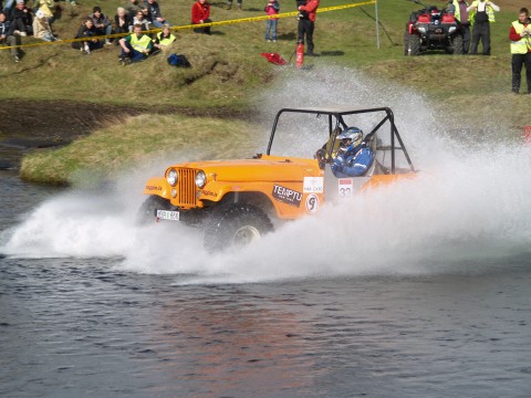 Hannes Berg taking his his CJ Willys on the river.