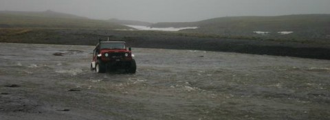 Land Rover crossing the river