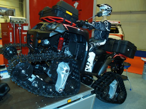  ATV on what looks like MatRacks should work well in the snow