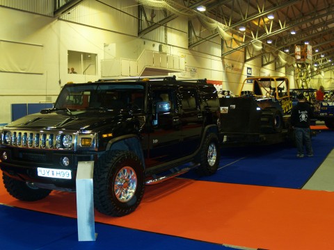 A pitch black Hummer H2 owned by Gisli Gunnar Jonsson who uses it to haul his Formula Off Road truc