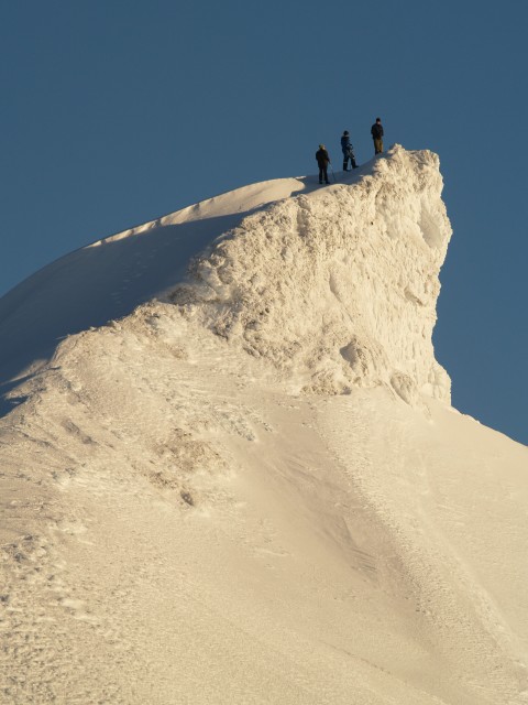 A few daring people in the group take a hike up this small peak and get the best view and some good exercise.