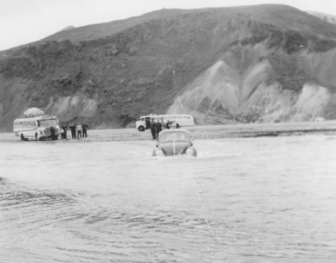 Sailing a VW beetle over the river Jokulgilskvisl in the spectacular Landmannalaugar area. The river looks unsuitable for the larger mountain trucks waiting on the river bank. Photo: Páll Sigurðsson.