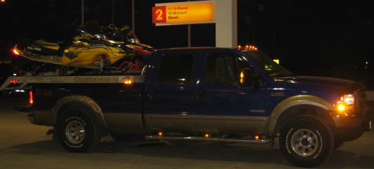 F-350 with two snowmobiles