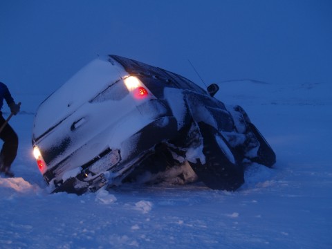 Explorer Sport Trac falls into a hidden cavity