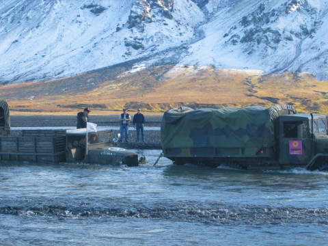 Old Army Trucks - REO preparing