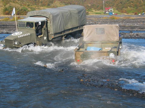Old Army Trucks in Deep Water