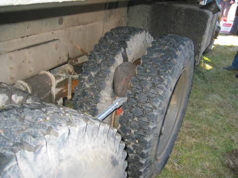 Old Army Trucks Pick up Stones