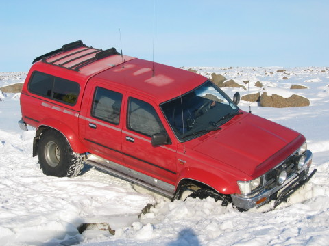 Toyota Hi-Lux stuck in a stream